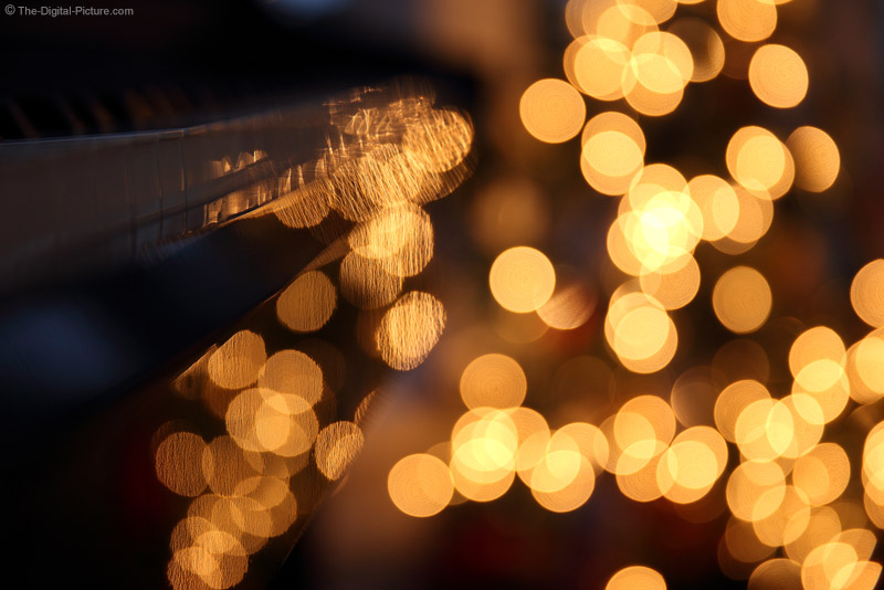 Christmas Lights Reflecting on Piano
